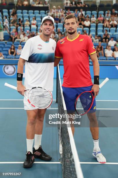 Cameron Norrie of Great Britain and Alexander Cozbinov of Moldova pose ahead of their Group C singles match during day five of the 2020 Sydney...