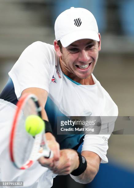 Cameron Norrie of Great Britain plays a backhand during his Group C singles match against Alexander Cozbinov of Moldova during day five of the 2020...