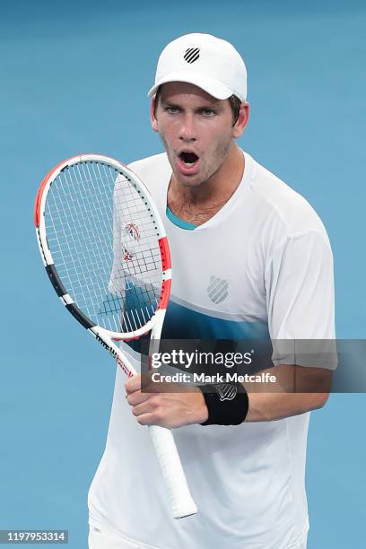 Cameron Norrie of Great Britain celebrates winning match point during his Group C singles match against Alexander Cozbinov of Moldova during day five...