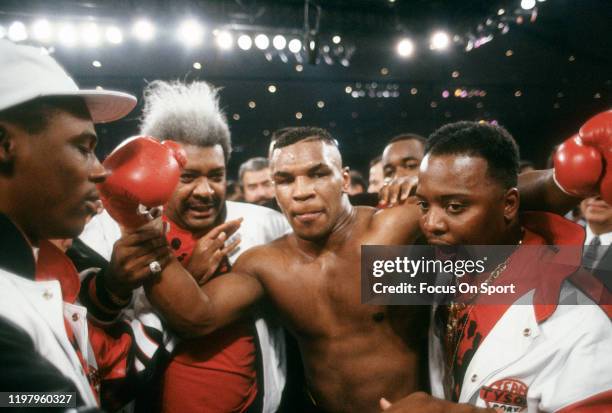 Mike Tyson celebrates after defeating James Tillis in a Heavyweight fight May 3, 1986 at The Civic Center in Glens Falls, New York. Tyson won the...