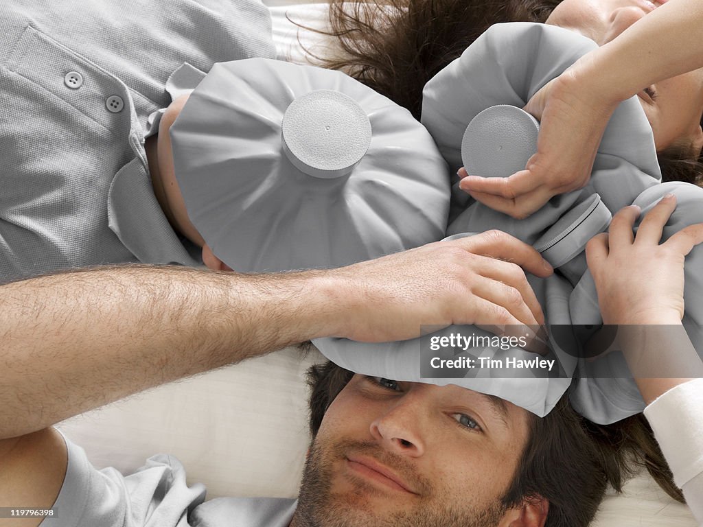 Family of four with ice packs