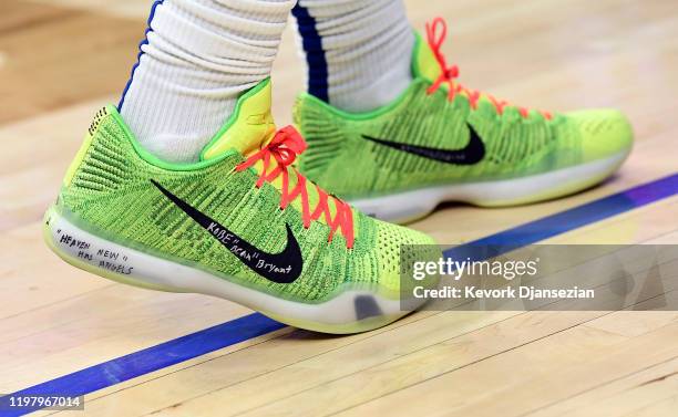 Montrezl Harrell of the Los Angeles Clippers sneakers with words honoring Kobe Bryant his daughter Gianna and seven victims of the fatal helicopter...