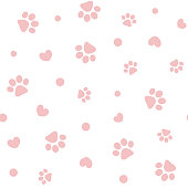 Seamless pattern with pink pet pawprints and hearts.