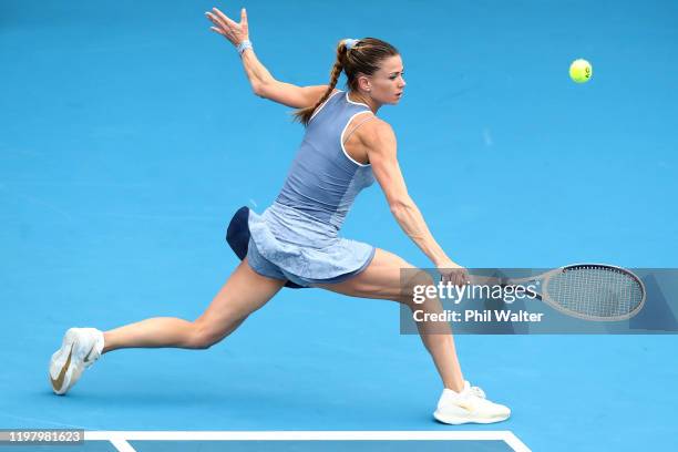 Camila Giorgi of Italy plays a backhand in her first round match against Serena Williams of the USA during day two of the 2020 ASB Classic at ASB...