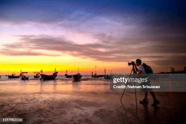 photographer like to travel and photography. - photographer seascape stock pictures, royalty-free photos & images