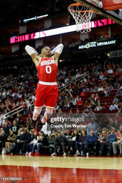 Russell Westbrook of the Houston Rockets goes up for a dunk in the second half against the Philadelphia 76ers at Toyota Center on January 03, 2020 in...