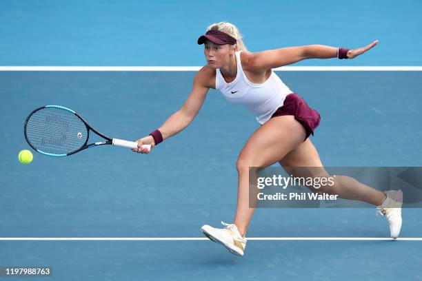 Paige Hourigan of New Zealand plays a forehand during her first round match against Caroline Wozniacki of Denmark during day two of the 2020 ASB...