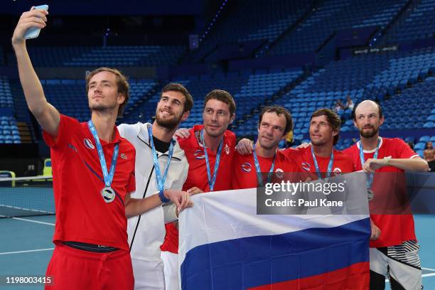 Daniil Medvedev, Karen Khachanov, Marat Safin, Teymuraz Gabashvili, Ivan Nedelko and Konstantin Kravchuk of Team Russia take a selfie after winning...