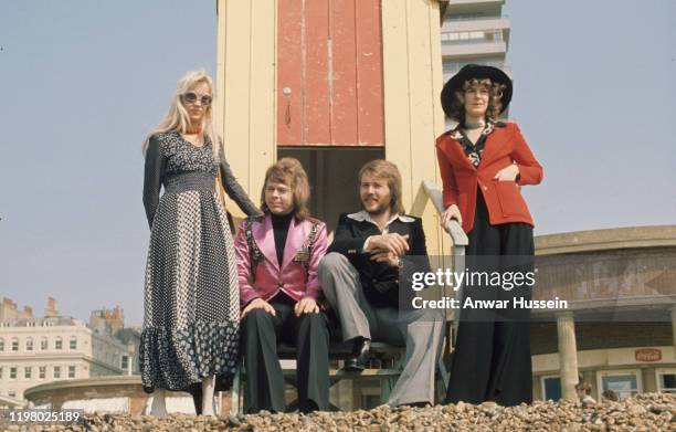 Swedish pop group Abba, winners of the 1974 Eurovision Song Contest, pose on the beach on April 08, 1974 in Brighton, England.