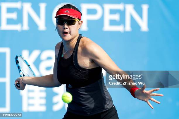 Duan Yingying of China returns a shot during the women's singles 1st round match against Zarina Diyas of Kazakhstan on day 3 of the 2020 WTA Shenzhen...