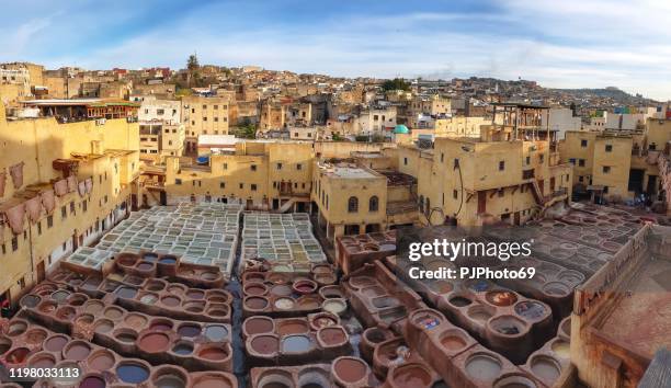 panoramic view of chouara tannery in fes - morocco - fez morocco stock pictures, royalty-free photos & images