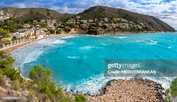 cala el portet beach in moraira alicante mediterranean - alicante spain stock pictures, royalty-free photos & images