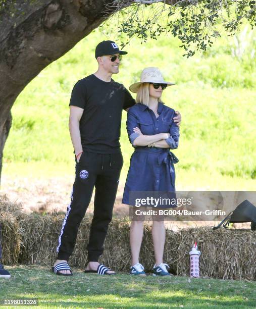 Jim Toth and Reese Witherspoon are seen on February 01, 2020 in Los Angeles, California.