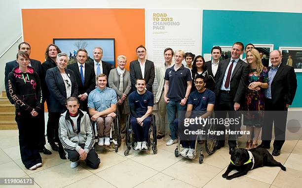 London 2012 team members pose during "Road to 2012: Changing Pace," the unveiling of new portraits of the people making London 2012 happen, at the...