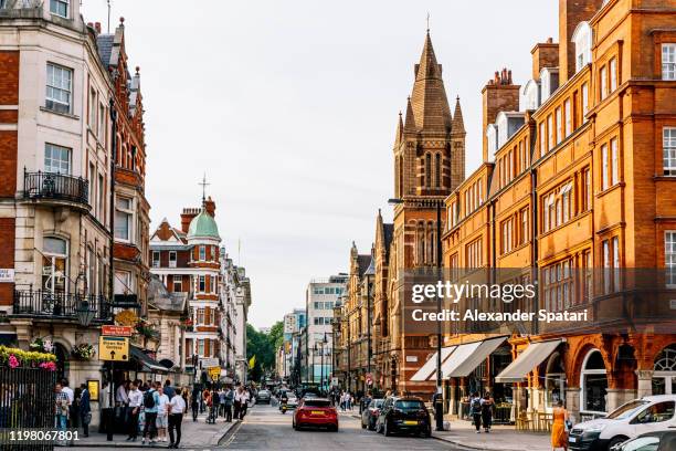 street in mayfair district on a sunny day, london, england, uk - london pub stock pictures, royalty-free photos & images