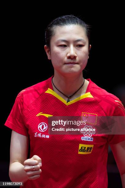 February 2020, Saxony-Anhalt, Magdeburg: Table tennis: German Open, women, singles, semi-finals, Ding - Wang . Ding Ning clenches fist Photo: Swen...