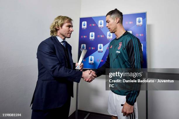 Cristiano Ronaldo of Juventus receive best player of the month by Juventus' Vice-President Pavel Nedved before the Serie A match between Juventus and...