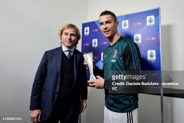 Cristiano Ronaldo of Juventus receive best player of the month by Juventus' Vice-President Pavel Nedved before the Serie A match between Juventus and...
