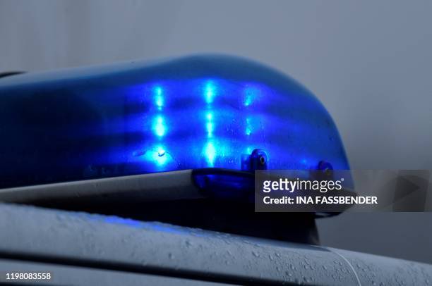 Picture taken on February 2, 2020 shows a flashing blue light of a police car in Datteln, western Germany.