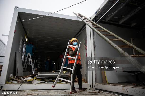 Huoshenshan Hospital construction nears completion on February 2, 2020 in Wuhan, China. The 25,000 square metre emergency specialty field hospital,...