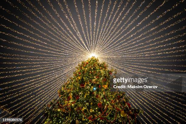 new year & christmas decorations in moscow, russia - christmas decorations stockfoto's en -beelden