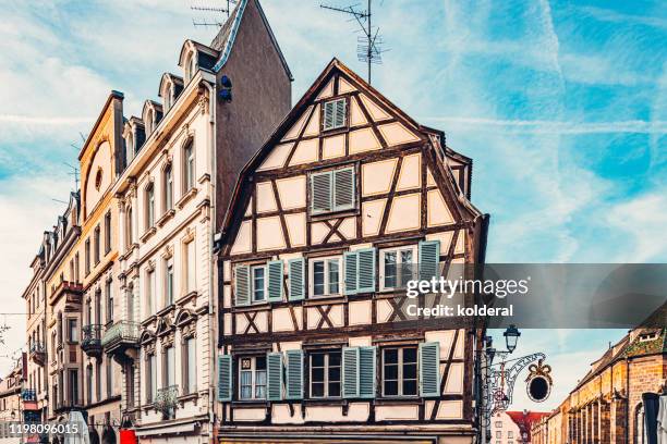 half-timbered building in alsace, france - obernai stockfoto's en -beelden