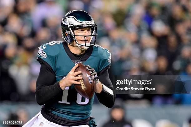 Josh McCown of the Philadelphia Eagles looks to pass against the Seattle Seahawks in the NFC Wild Card Playoff game at Lincoln Financial Field on...