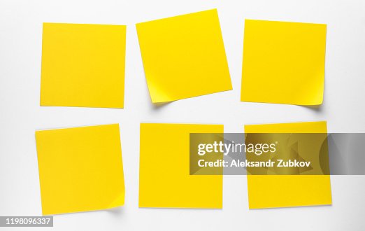 Yellow Sticky Stickers On A White Background To Remind You Of Information. Space For Text. Yellow Sticky Stickers On A White Background To Remind You Of Information. Space For Text.