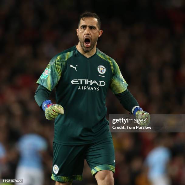 Claudio Bravo of Manchester City celebrates Bernardo Silva scoring their first goal during the Carabao Cup Semi Final match between Manchester United...