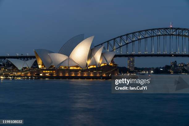 sydney opera house and harbor bridge, sydney, australia (sunset) - sydney skyline opera house and harbor bridge imagens e fotografias de stock