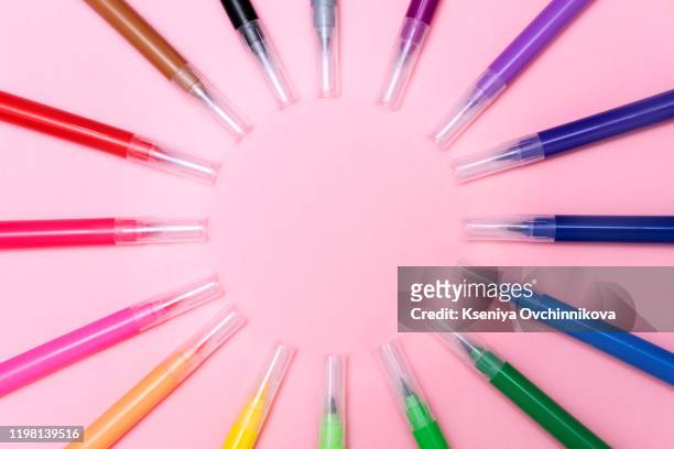 https://media.gettyimages.com/id/1198139516/photo/a-set-of-multi-colored-markers-arranged-diagonally-on-a-pink-millennial-background-the.jpg?s=612x612&w=gi&k=20&c=rOzOd5jQkwa2B-QFFaGml37rp7gunHqSKhSxti9Y-dA=