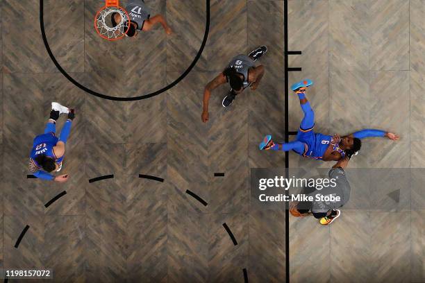 Wilson Chandler of the Brooklyn Nets and Hamidou Diallo of the Oklahoma City Thunder battle for the ball at Barclays Center on January 07, 2020 in...