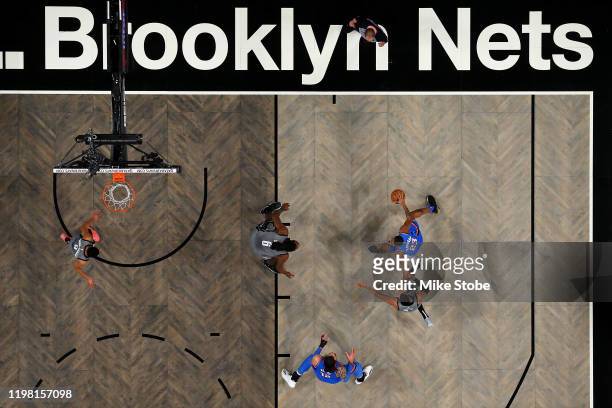 Wilson Chandler of the Brooklyn Nets defends against Terrance Ferguson of the Oklahoma City Thunder at Barclays Center on January 07, 2020 in New...
