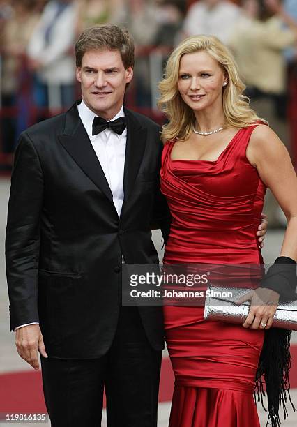 German actress Veronica Ferres and her partner Carsten Maschmeyer arrive for the Bayreuth festival 2011 premiere on July 25, 2011 in Bayreuth,...
