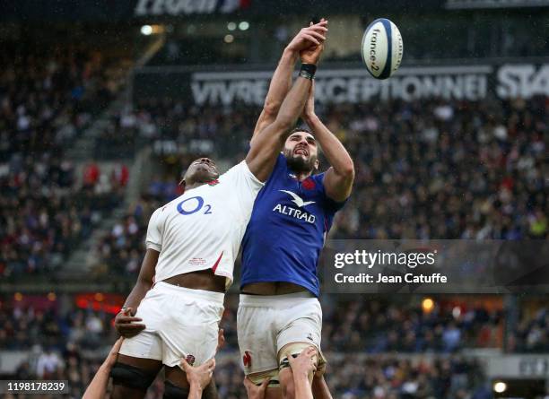Charles Ollivon of France competes for lineout ball with Maro Itoje of England during the 2020 Guinness Six Nations match, the crunch between France...