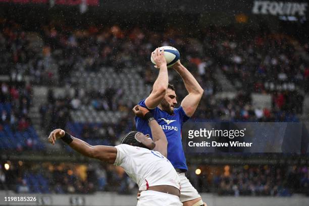 Charles OLLIVON of France and Maro ITOJE of England during the Six Nations match Tournament between France and England at Stade de France on February...
