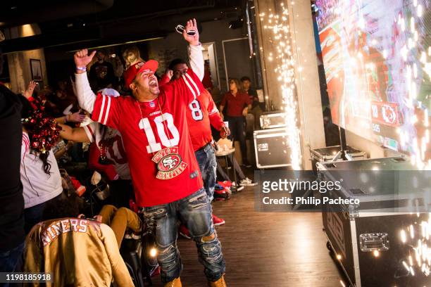 Trae Beauchamp of Oakland, California reacts to a San Francisco 49ers touchdown while watching the San Francisco 49ers play the Kansas City Chiefs...