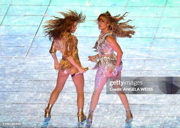 Singer Jennifer Lopez and Colombian singer Shakira perform during the halftime show of Super Bowl LIV between the Kansas City Chiefs and the San...