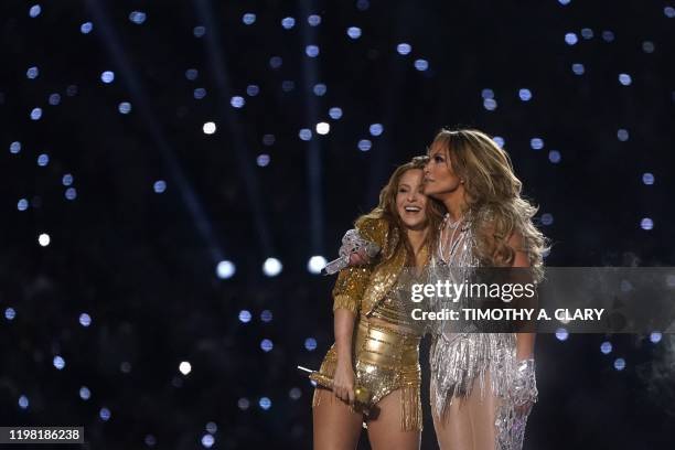 Singer Jennifer Lopez and Colombian singer Shakira perform during the halftime show of Super Bowl LIV between the Kansas City Chiefs and the San...