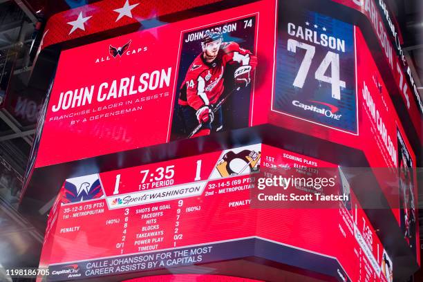 General view of the scoreboard during the first period of the game against the Pittsburgh Penguins as John Carlson of the Washington Capitals is...