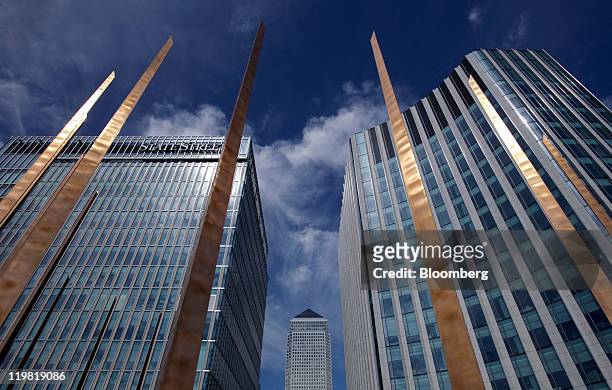 No.1 Canada Square, center, the registered offices for ratings agency Moody's Investors Service is seen at the Canary Wharf business district in...
