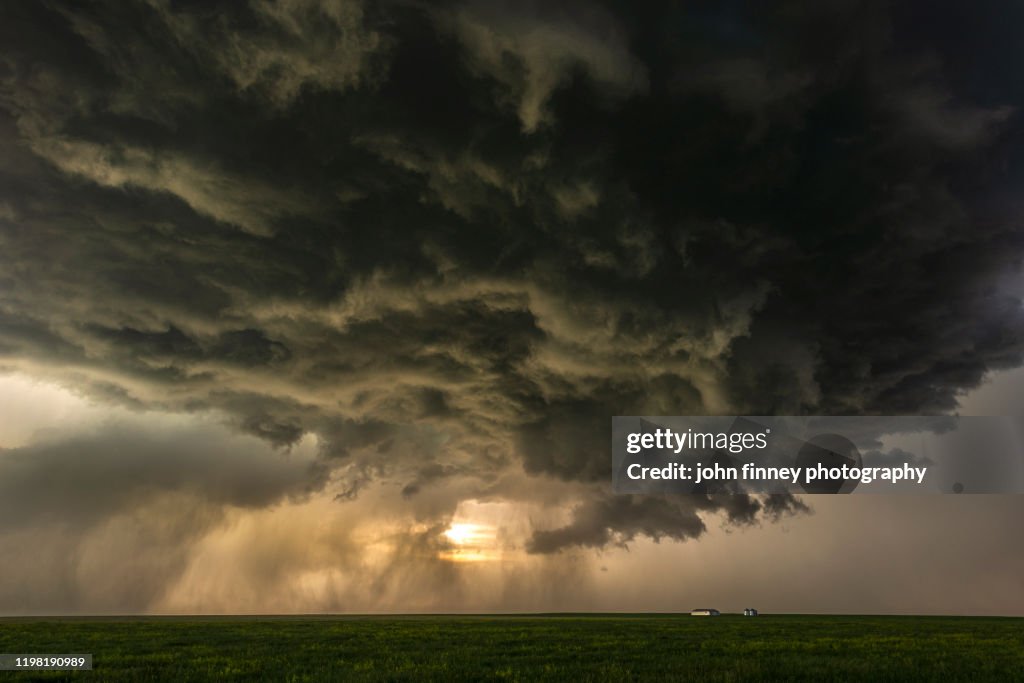 Tornado warned supercell storm at sunset near Judith Gap, Montana. USA