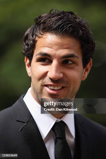 Arsenal and Spanish international footballer Cesc Fabregas attends a reception in the garden of 10 Downing street on July 25, 2011 in London,...