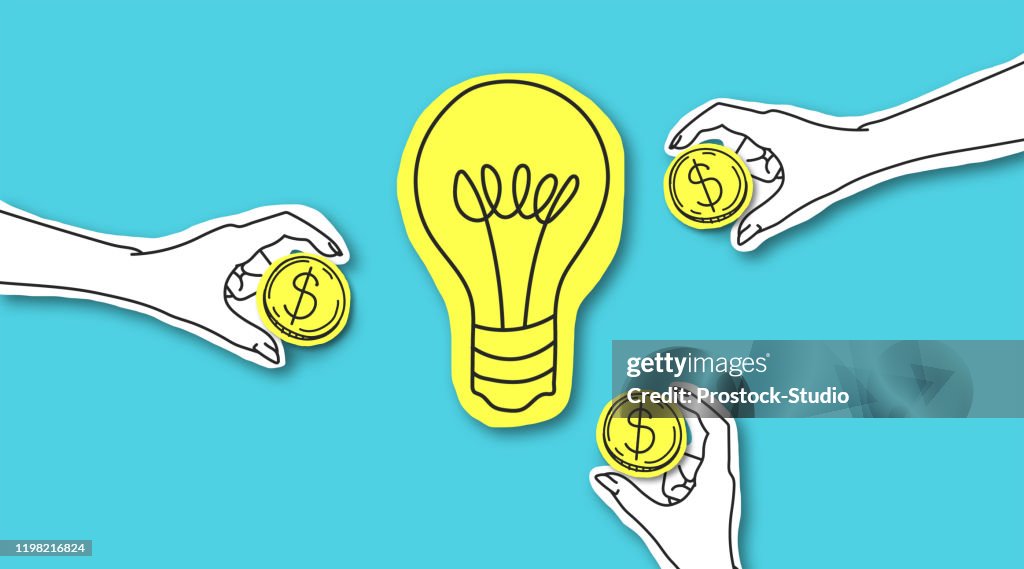 手與美元標誌硬幣周圍的黃色燈泡