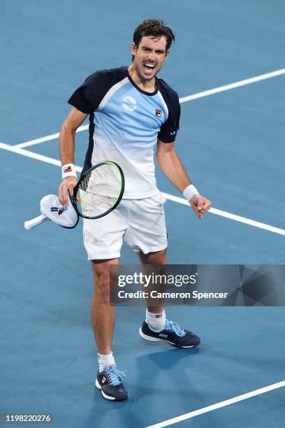 Guido Pella of Argentina celebrates winning his Group E singles match against Marin Cilic of Croatiaduring day six of the 2020 ATP Cup Group Stage at...