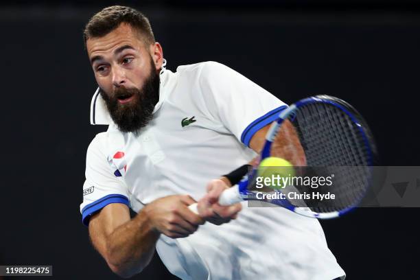 Benoit Paire of France plays a backhand in his match against Kevin Anderson of South Africa during day six of the 2020 ATP Cup Group Stage at Pat...