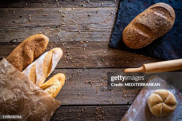 bread varied group with copy space - dark bread stock pictures, royalty-free photos & images