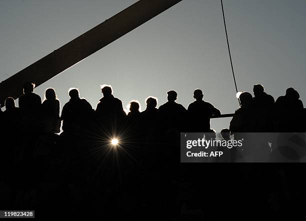 Supporters wait for the beginning of the the third-place match Peru VS Venezuela of the 2011 Copa America football tournament held at the Ciudad de...