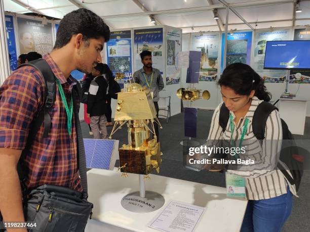 U2013 January 4: Attracting onlookers is a scale model made of brass of the second Indian mission to the moon Chandrayaan-2 on display at a stall at...