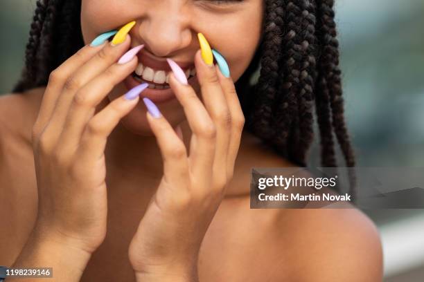 african american model with trendy nail paint - african american nails stock pictures, royalty-free photos & images